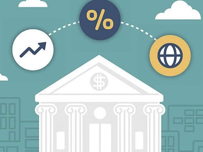 This image features a prominent, stylized white illustration of a classic bank or credit union building with a triangular pediment and ionic columns, centered against a light teal background. A dollar sign icon is faintly visible within the pediment, subtly emphasizing financial services. Above the building, bold red text reads "CONSUMERS CREDIT UNION REVIEW," with "CREDIT UNION" and "REVIEW" highlighted in red for emphasis, clearly stating the article's focus. To the left, a white circular icon displays an upward-trending arrow graph, symbolizing growth, investments, or high yields. To the right, a muted yellow circle contains a globe icon, suggesting nationwide availability and widespread access to the Consumers Credit Union's offerings, such as their high-yield checking accounts and free checking options, as discussed in the accompanying article.