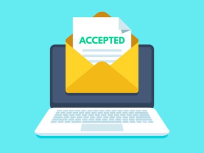 A stylized illustration on a light blue background depicts an open, bright yellow envelope emerging from the screen of a silver laptop. Inside the envelope, a white document is visible with the word "ACCEPTED" prominently displayed in bold green letters, symbolizing success in college applications or scholarship awards. The laptop's screen shows the bottom portion of the envelope, while its keyboard and trackpad are detailed with gray keys, suggesting an online application or notification process. In the lower-left corner, the white text "THE COLLEGE INVESTOR" is clearly visible, identifying the brand and reinforcing the image's relevance to financial aid and higher education. This image visually represents the positive outcome of using college scholarship search websites to find and secure financial assistance, directly supporting the article's focus on helping students pay for college by highlighting the rewarding feeling of receiving an acceptance or scholarship notification. Source: The College Investor