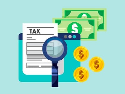 A brightly colored, illustrated image on a light blue background depicts elements related to contacting the IRS and tax assistance. In the foreground, a prominent blue magnifying glass is centered, symbolizing the act of searching for information or examining tax documents. Behind it to the left, a white tax form or document with the word "TAX" clearly visible at the top is partially displayed, suggesting the need for help with tax issues. To the right, three golden coins with dollar signs are stacked, representing financial aspects and money associated with taxes. In the background, subtly visible green banknotes further emphasize the financial context of the Internal Revenue Service. The overall image, titled "CONTACT THE IRS (IRS PHONE NUMBERS)," visually reinforces the article's focus on how to contact the IRS the fastest and the best IRS phone numbers to call for assistance with tax-related problems. Source: The College Investor