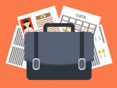 This illustrative banner image for a "Holdfolio Review" features a bold, red "REVIEW" text prominently displayed in the upper center, hinting at the in-depth analysis of the real estate crowdfunding platform discussed in the accompanying article. Below the "REVIEW" text, a dark grey briefcase with a prominent buckle closure is depicted, symbolizing professional investment and financial management, directly relating to the article's focus on investing in multifamily real estate properties. To the right of the briefcase, a stylized representation of apartment complexes or other real estate structures with small windows in shades of white and grey reinforces the core business of Holdfolio, which concentrates on multifamily real estate. The background features a solid, light orange or peach color, providing a clean and approachable aesthetic for the financial topic. The overall image contextually sets the stage for a detailed discussion about Holdfolio's unique offering, where the platform invests its own money alongside investors in real estate deals.