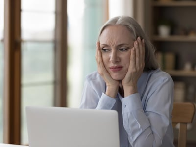 Frustrated borrower in the student loan chaos | Photo: fizkes