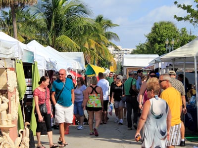 LAUDERDALE-BY-THE-SEA, FLORIDA - OCTOBER 28: People looking at the 14th annual craft festival where local artists display at outdoor galleries on October 28, 2012 in Lauderdale-by-the-Sea, Florida.
