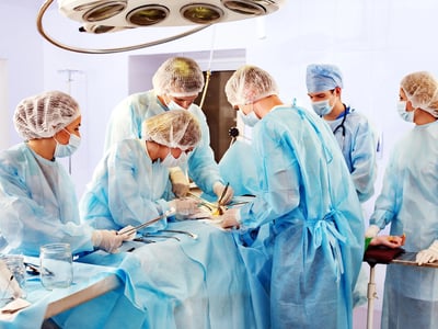 Nurses and Surgeon Working in Operating Room