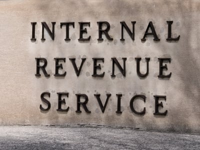 Internal Revenue Service sign at the IRS Building in Washington, DC — Photo by paulbradyphoto