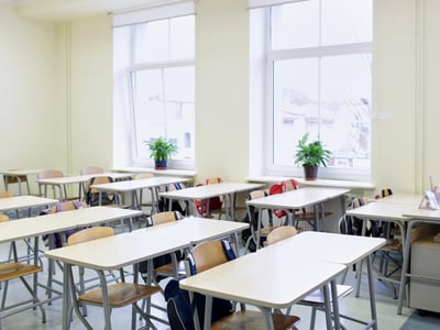 Elementary school classroom with desks