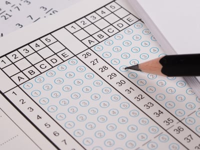 Standard test form or answer sheet. Answer sheet focus on pencil. Bubble anser sheet with blank answer. School exam answer sheet and pen.