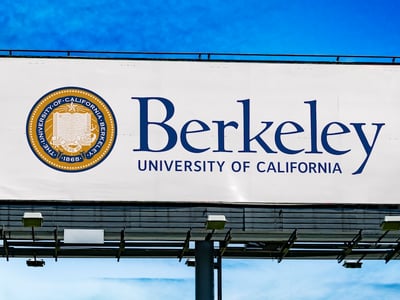 Advertisement billboard displaying logo of The University of California, Berkeley, a public, land-grant research university in Berkeley, California, USA