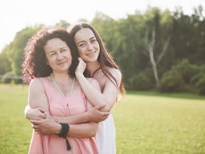 Mom and teenage daughter going to college