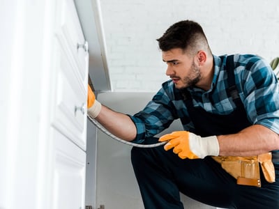 Handyman Fixing Kitchen Sink