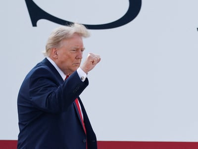 U.S. President Donald Trump gestures as he boards the new Air Force One, a plane gifted by the Qatari government, at Joint Base Andrews, Maryland, U.S., July 1, 2026. REUTERS/Kylie Cooper