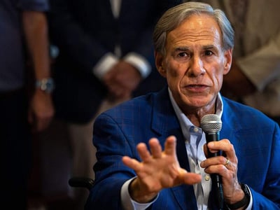 Texas Gov. Greg Abbott speaks during a press conference on Wednesday, July 29, 2026, in Fort Worth, Texas. (Elvis Martinez-Cartagena/Fort Worth Star-Telegram/TNS/ABACAPRESS.COM - NO FILM, NO VIDEO, NO TV, NO DOCUMENTARY. No Use: Paris Match, Public, Voici, Closer, Gala, Elle, PDV and Le Point.