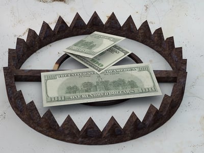 Financial Trap with Dollar Bills in a Bear Trap