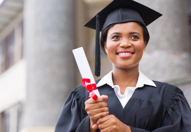 beautiful young afro american graduate holding diploma. Source: The College Investor