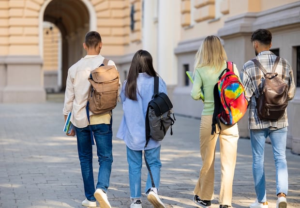 College Students Walking On Campus