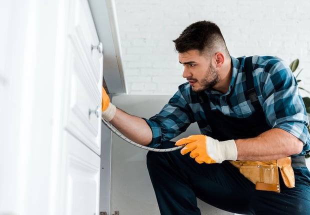 Handyman Fixing Kitchen Sink