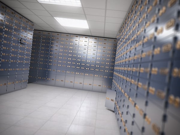Safe deposit boxes room inside of a bank vault. Safe Deposit Box Inside Bank | Source: Depositphotos