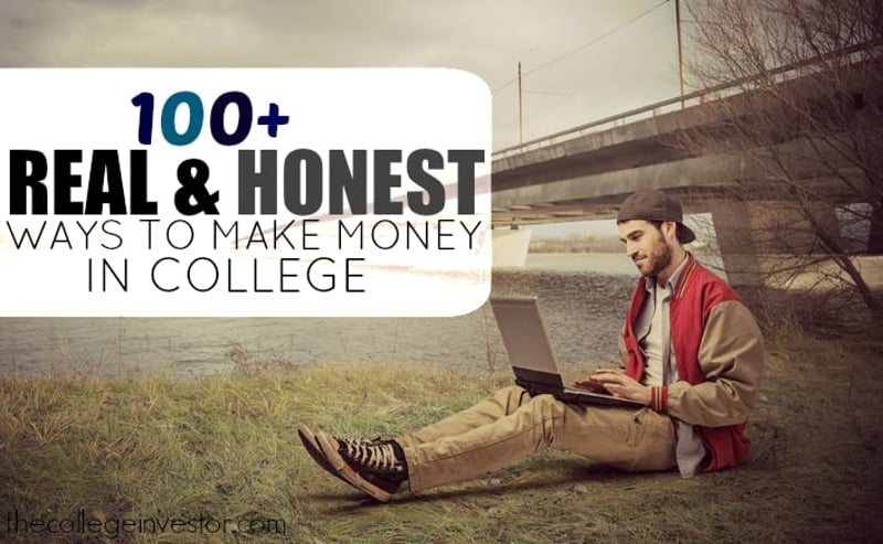 A young man with a beard and a baseball cap is seated on a grassy bank next to a body of water, intently typing on a silver laptop. He is wearing a red and tan letterman-style jacket over a grey shirt, with khaki pants and dark sneakers. In the background, a large concrete bridge spans across the water, with bare trees visible on the opposite bank under an overcast sky. A white speech bubble overlay in the upper left corner of the image contains the dark blue text "100+ REAL & HONEST WAYS TO MAKE MONEY IN COLLEGE," directly relating to the article's topic of various methods for college students to earn income, including entrepreneurial ventures like starting a blog or freelance writing. The bottom left corner subtly displays "thecollegeinvestor.com".