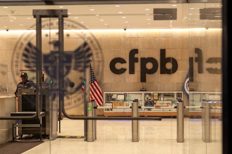 A security officer works inside of the Consumer Financial Protection Bureau (CFPB) building headquarters, Feb. 10, 2025, in Washington. (AP Photo/Jacquelyn Martin, File)