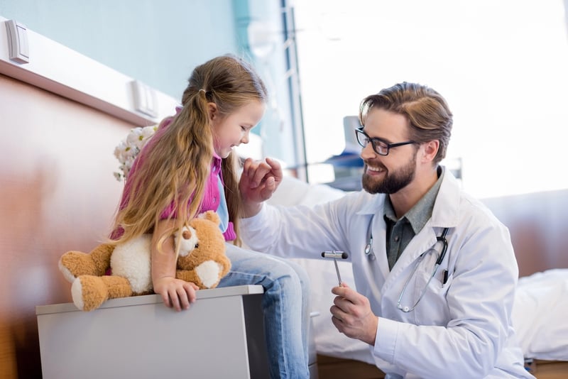 Doctor and Patient HSA A doctor and young patient illustrating the 2027 HSA contribution limits were release. Source: The College Investor