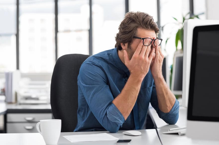 Stressed young businessman Frustrated student loan borrower. Photo: ridofranz