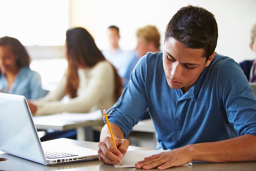 High School Students Taking Test In Classroom High School Students Taking Test In Classroom | Source: The College Investor