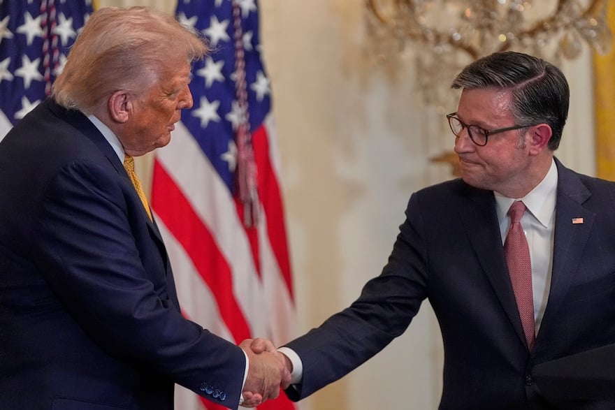 Trump President Donald Trump shakes hands with House Speaker Mike Johnson of La., during a reception for Republican members of Congress in the East Room of the White House, Tuesday, July 22, 2025, in Washington. (AP Photo/Julia Demaree Nikhinson)
