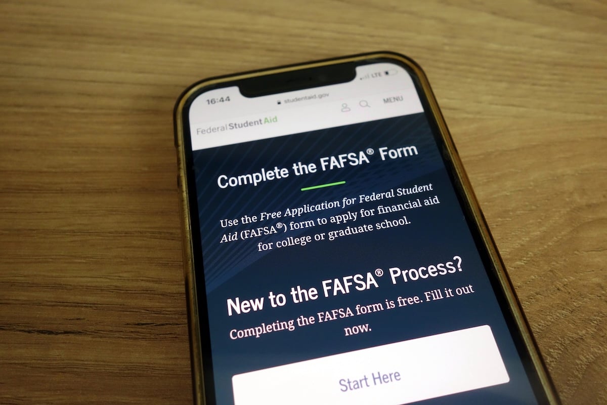 studentaid.gov website about FAFSA form displayed on mobile phone