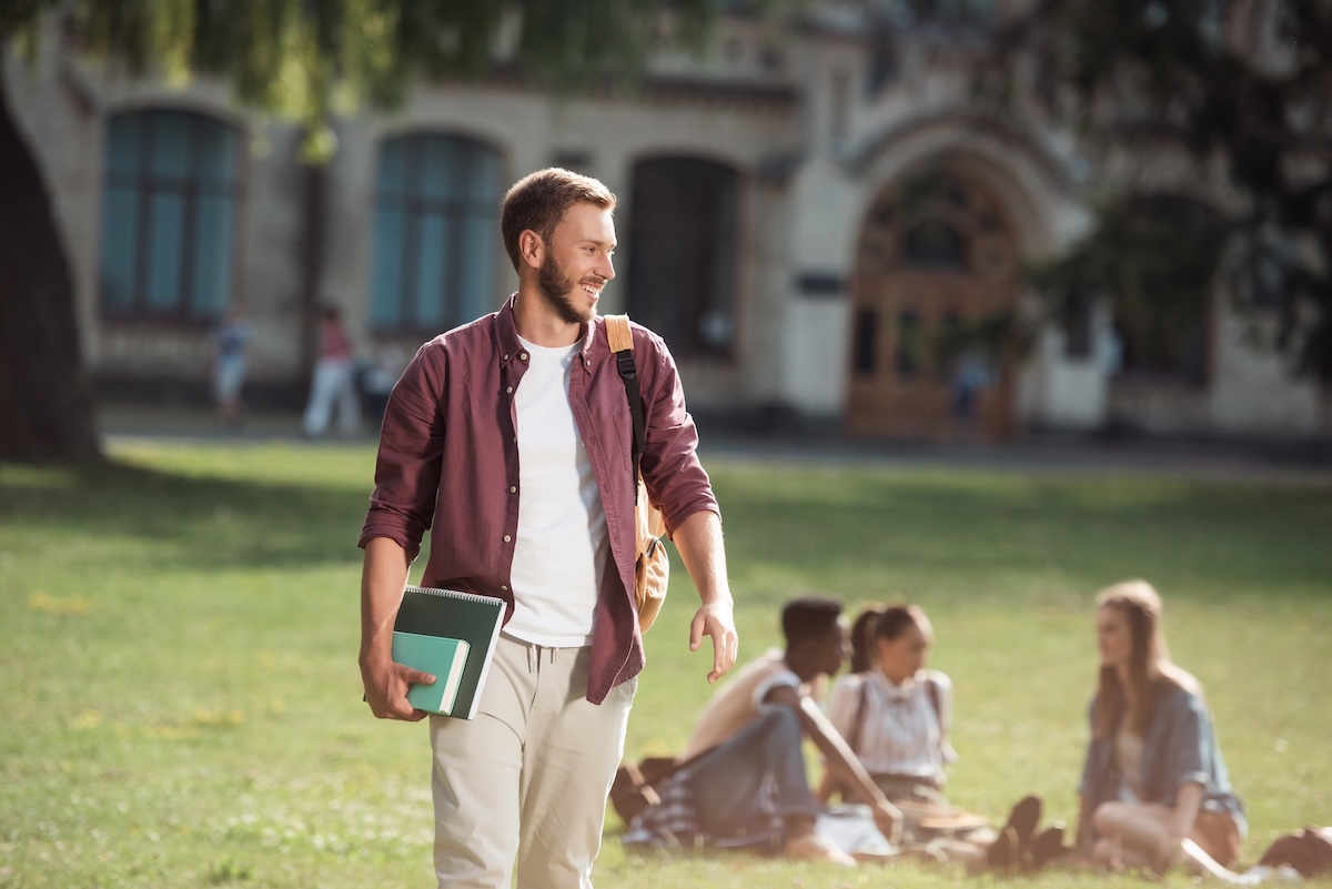 College Student Walking On Campus | Source: The College Investor