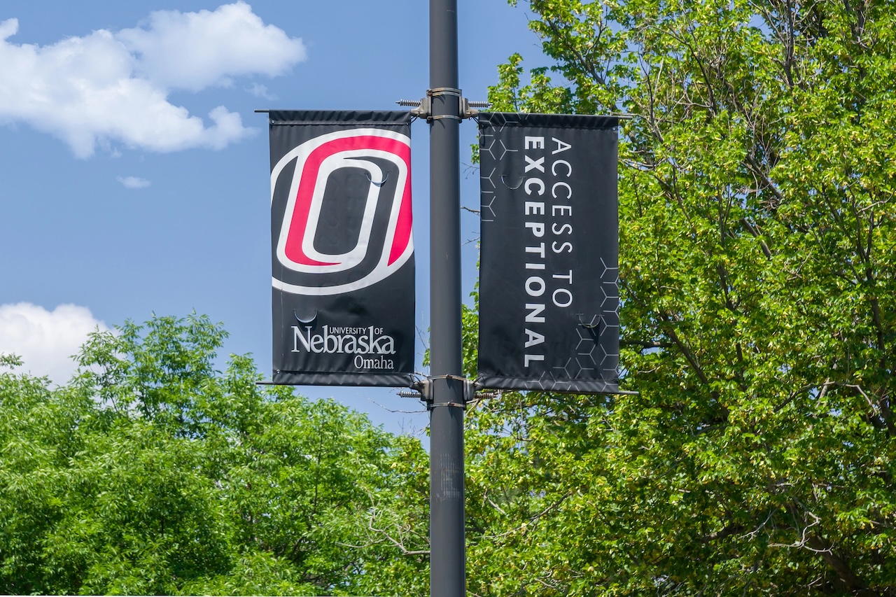 OMAHA, NE, USA - College flag on the campus of the University of Nebraska Omaha.